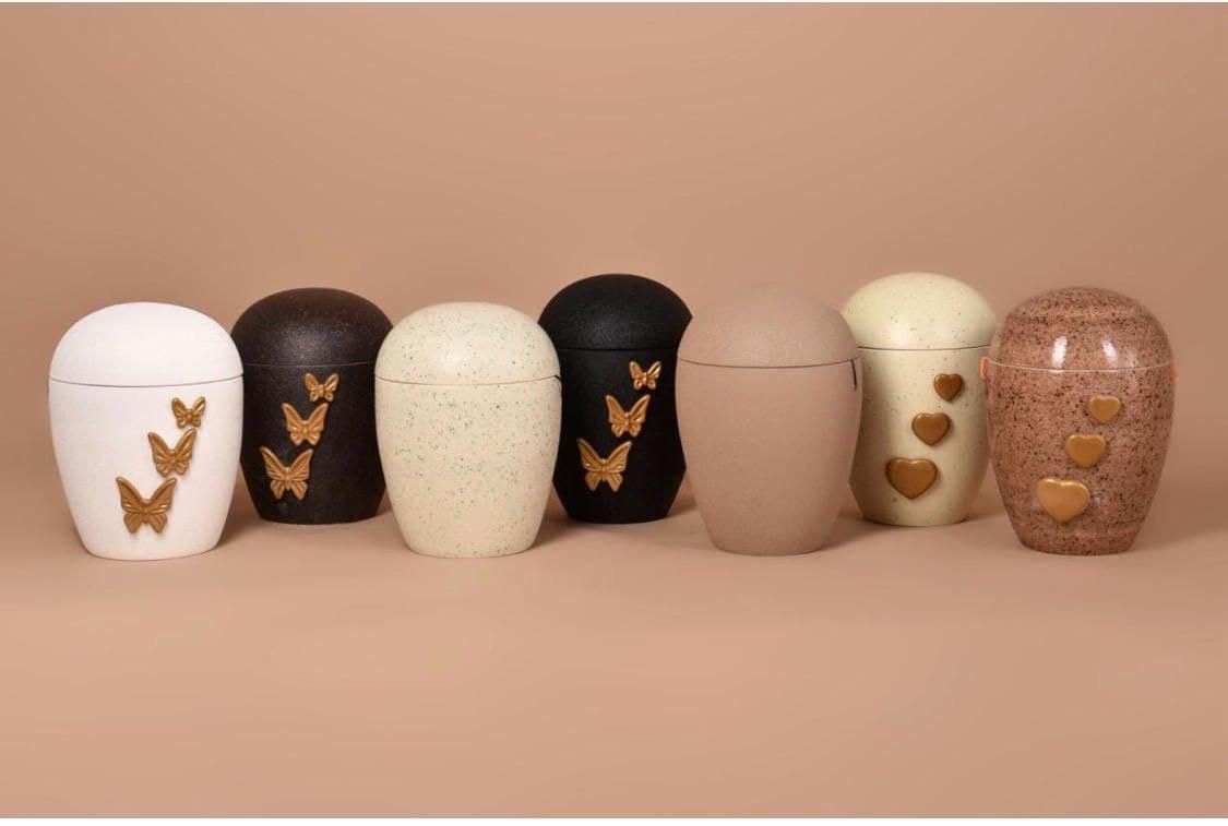 A selection of handcrafted ceramic urns in different finishes